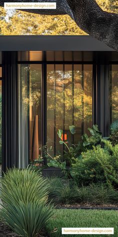 the exterior of a modern home surrounded by trees and plants with text overlaying it