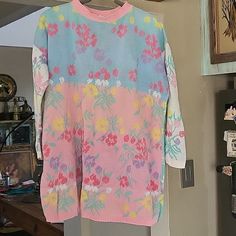 Vintage 1980’s Betsey Johnson Rare Punk Label 100% Cotton Knit Baggy Sweater Please Check The Measurements Below. Good Condition - General Wear. No Stains. Neck Line Is Lightly Stretched Original 1980’s Dress. Label “Betsey Johnson”. Long Sleeve Sweater Dress With Multicolor Pastel Rose Floral Design. Pullover Style. Material Is 100% Cotton. Measurements (Taken Flat) Material Has A Lot Of Stretch. Bust: 27” Put To Pit Waist: 27" Length: 29” Sleeve: 18” (Shoulder To Cuff) Shoulder: 25” Retro Knit Sweater For Spring, Retro Multicolor Sweater For Spring, Retro Crew Neck Sweater For Spring, 90s Style Long Sleeve Spring Sweater, Betsey Johnson Vintage, Spring Retro Knit Sweater, Vintage Pink Sweater For Spring, Betsey Johnson 70s, Spring Vintage Pink Sweater