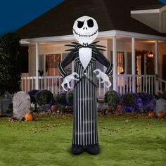 an inflatable jack skellingy standing on the lawn