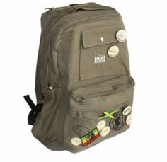 "This stylish military green Bob Marley backpack has the following key features: Heavyweight cotton canvas outer shell, Exposed metal zippers, 4-pack Button Set included for greater design customization, padded back panel, comfortable padded carry straps, inside media pocket with zipper closure at the top of the backpack, main front pocket with key clip inside, smaller accent front pocket with snap-closure and an Internal organizer pocket. Approximate dimensions: 18\"H x 13\"W x 5.5\"D" African Sleeve Tattoo, Green Bob, Leather Backpacks School, Marie Cat, Vegan Leather Backpack, Leather Backpack Purse, Medium Backpack, Patterned Backpack, Key Clip