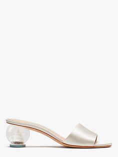 For the bride-to-be: Toss the bouquet in that magical white dress and these slide sandals, featuring a snow globe heel with a wedding cake for the occasion... | Kate Spade Love Slide Sandals, Ivory Bridal Bride Heels, Kate Spade Bridal, Romantic Summer, Eye Spy, Bridal Sandals, Bridal Heels, Trainer Heels, Ivory Bridal, Pinterest Closet