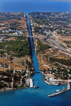 an aerial view of a waterway with boats in it