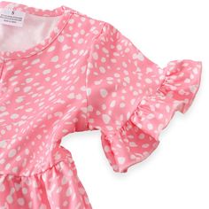 NEW! Our mommy and me matching dresses are gorgeous! Featuring a pretty Pink and White dot print with short flutter sleeves, front buttons and a relaxed tiered silhouette. Soft and comfortable, you and your little one will look fabulous together. Style with a hat and your favorite Summer sandals or layer on with a cardigan for transition into Fall. Perfect for photos. Pre-order your sizes now before we sell out your size! Shipping: Items ship to you within 2-3 weeks of order date. Model Number: Playful Ruffled Short Sleeve Dress, Playful Short Sleeve Dress With Ruffles, Playful Summer Dresses With Butterfly Sleeves, Cute Polka Dot Dress With Ruffles, Pink Family Matching Dresses For Spring, Flowy Polka Dot Dresses With Ruffles, Playful Short Sleeve Printed Dresses, Pink And White Stripes, Summer Sandals