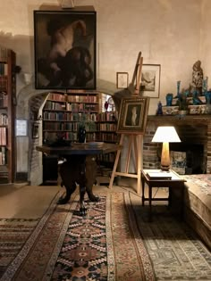 a dog is standing in the middle of a room with bookshelves and paintings on the walls