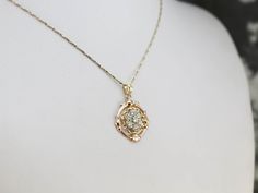 "The quality of these diamonds is outstanding! There are six stones with a total weight of .26 carats. The clarity is superb: VS on average, and the color is a bright, clean K rating. Individually each one of these would be eyecatching. Worked together into this floral cluster, they catch the light and reflect in the most beautiful way! This pendant does not come with the chain shown. Please feel free to contact us, we will help you find the perfect chain for your style and budget! Metal: 14K Ro Dazzling Rose Cut Diamond Necklace For Anniversary, Exquisite Rose Cut Diamond Necklace For Anniversary, Oval Diamond Necklace With Accents For Anniversary, Oval Diamond Necklace With Single Cut Diamonds For Wedding, Oval Single Cut Diamond Necklace For Wedding, Pendant Diamond, Snowflake Pendant, Gold Snowflake, Ceylon Sapphire