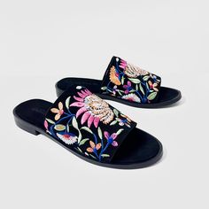 Experience luxury and style with our Rose black embroidered suede leather mule sandal. Made from high-quality suede leather, these mules feature intricate multicolor flower embroidery for a unique and elegant look. Slip into these mules for a comfortable and chic addition to your wardrobe. Features: Flower embroidery for floral look Cushioned footbed with suede leather covering Day to day wear Composition: Upper - 100% Leather Lining - 100% Leather Sock - 100% Leather Outsole - 100% Rubber Embellished Open Toe Mules For Summer, Embellished Open Toe Mules For Spring, Spring Embellished Open Toe Mules, Black Embroidered Open Toe Sandals, Leather Socks, Rose Black, Mule Sandals, Leather Mules, Flower Embroidery