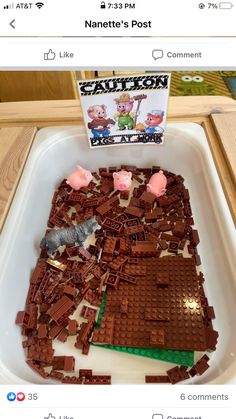 a box filled with legos and pigs in it