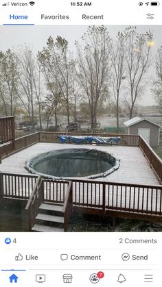 an image of a pool in the middle of a yard that has snow on it