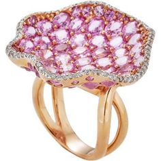 As you search for the perfect piece of jewelry to surprise your significant other, look no further than Piranesi's Wave Mosaique Ring in Pink Sapphire. This exquisite ring boasts 11.54 carats of round-oval Pink Sapphires, sparkling brilliantly alongside 0.32 carats of round White Diamonds. The ring is set in a luxurious combination of 18K Yellow and Rose Gold, creating a unique and striking aesthetic.The Wave Mosaique Ring is the perfect choice for a special occasion or just to show your love an Luxury Cluster Diamond Ring With Gemstone, Fine Jewelry Sapphire Ring With Pave Setting, Luxury Pink Sapphire Ring For Formal Occasions, Elegant Pink Cluster Ring With Brilliant Cut, Luxury Jewelry With Rose Cut Diamonds And Pink Sapphire, Elegant Pink Diamond Cluster Ring, Exquisite Pink Sapphire Rings For Formal Occasions, Luxury Pink Sapphire Diamond Ring With Gemstone, Exquisite Pink Sapphire Rings For Formal Events