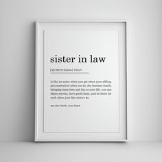 a white framed poster with the words sister in law on it's front and back