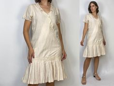 -->DESCRIPTION<-- Vintage 80s gorgeous linen dream dress by iconic designer Nancy Johnson! Love the romantic crochet lace and 1920s vibes! Would make a wonderful rustic wedding dress! -->SIZE<-- Marked 8, more like a modern 6 or smaller -->CONDITION<-- Great vintage condition. -->FABRIC<-- 100% Linen Measurements taken with garment laying flat, please double sizes of bust, waist and hips to fits the body (we suggest you compare measurements to a fitting item that you already have:) Bust: 20 inches  Waist: 19.5 inches Length: 20 inches It goes without saying that vintage and antique clothing items have been pre-loved and pre-worn. It is recommended that they be professionally cleaned upon receipt.  *All sales final, no returns, so please contact me with any specific questions or concerns be Rustic Wedding Dresses, Antique Clothing, Faux Wrap Dress, Crochet Lace, Dream Dress, Dress Clothes For Women, Clothing Items, Flapper Dress, Rustic Wedding