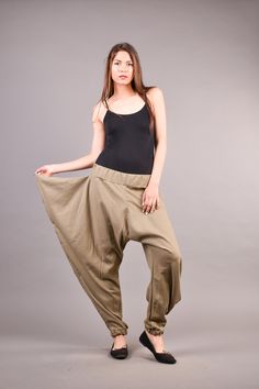 "Linen Harem Pants, Harem Trousers, Baggy Pants, Loose Pants. Extravagant harem trousers with interesting and unusual cut. The baggy pants are loose fit and feature drop crotch. The model is made of linen fabric so it is extremely comfortable women pants suitable for the daytime. If you are looking for the perfect addition to your casual outfit these loose pants are a great choice matched with flats or sneakers. ^ Sizes: The item can be made in sizes from XXS to 7XL. Please, use the size chart b