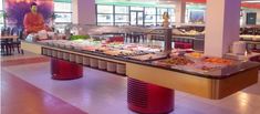 a buffet in a restaurant filled with lots of food