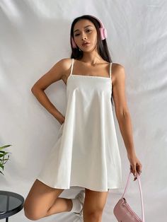 This Barbie Solid Spaghetti Strap Cami Dress is amazingly designed to provide you comfort with style the whole day. This dress blends a casual vibe with a touch of sophistication, making it perfect for any occasion. The plain pattern and sleeveless design exude simplicity, while the flared hem adds a delightful twist. Crafted from premium Polyester fabric, it offers ultimate comfort and a regular fit. Features: Style: Casual Pattern Type: Plain Type: Cami Sleeve Length: Sleeveless Hem Shaped: Fl Comfy Jumpsuits, Cami Dress, The Whole, Spaghetti Strap, Polyester Fabric, Spaghetti, Jumpsuit, Twist, Sleeve Length