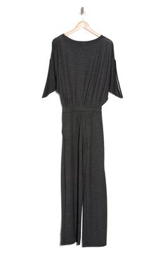 Soft, stretchy fabric offers lasting comfort in this casual jumpsuit that's framed by relaxed sleeves. Boat neck Short sleeves 47% rayon, 47% polyester, 6% spandex Machine wash, dry flat Made in the USA of imported fabric Versatile Stretch Jumpsuits And Rompers For Work, Versatile Relaxed Fit Jumpsuits And Rompers For Loungewear, Versatile Relaxed Fit Jumpsuits And Rompers For Work, Versatile Relaxed Fit Jumpsuits For Workwear, Casual Stretch Jumpsuits And Rompers For Work, Jumpsuit With Sleeves, Casual Jumpsuit, Stretchy Fabric, Boat Neck