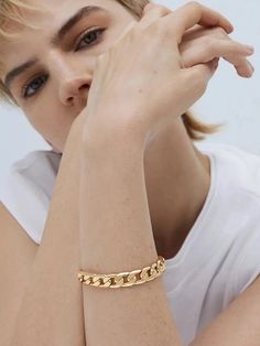 Equal parts feminine and masculine, the Walter Bracelet boasts flat, curb chain links that sit comfortably on skin. This top rated piece will finish any outfit with ease. Wear Walter on its own or mix with more structured bangles and personal pieces. 14K gold-dipped brass finish: high shine curb chain magnetic closure product measurements inner circumference: 6.6" / 16.7cm width: 0.4" / 10mm weight: 0.92oz / 26g imported Feminine And Masculine, Gold Link Bracelet, Jenny Bird, Chain Links, Metal Chain Link, Gold Bracelet Chain, Gold Piece, Gold Dipped, Eyewear Design