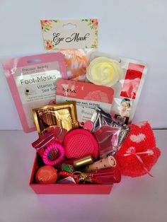 a pink box filled with lots of different items