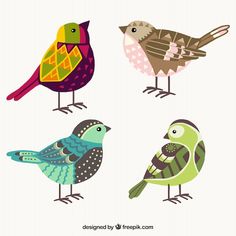 four colorful birds sitting on top of each other in different colors and sizes, with one bird