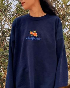 Embrace your California spirit and add a touch of whimsical charm to your wardrobe with our California sweatshirt embroidered with oranges. Shop now and let the sunshine in! ⭐  Product Details * Unisex Sizing * 50% cotton, 50% polyester * Embroidery will come with a white backing material. This is the stabilizer and is necessary to support the stitches. * Gildan 18000 Unisex Heavyblend Sweatshirt * Size up 1-2 sizes for a looser comfy fit ⭐  Care Instructions Wash with cold water. Hang drying is Cheap Orange Crew Neck Sweatshirt, Vintage Clothes Sweatshirts & Hoodies, Cheap Red Sweatshirt With Embroidered Graphics, Cheap Embroidered Red Sweatshirt, Cheap Embroidered Sporty Sweatshirt, Cheap Sporty Sweatshirt With Embroidered Graphics, Vintage Sweatshirt Lightinthebox, Cheap Women's Embroidered Sweatshirt, Affordable Vintage Sweatshirt With Embroidered Logo