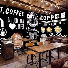 the coffee shop is decorated with many different types of signs and symbols on the wall