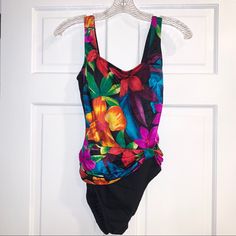 Gorgeous Colorful Floral One Piece Bathing Suit Size: 10 There Is Little To No Padding Never Worn! Multicolor Floral Print Stretch Swimwear, Multicolor Floral Print Swimwear For Parties, Vibrant Multicolor Swimwear For Party, Vibrant Multicolor Party Swimwear, Maternity One Piece Swimsuit, Nike Swimsuit, Maternity One Piece, Pink Calvin Klein, Blue Bathing Suit