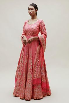 Peach floor length attached can-can anarkali with all over bandhani and floral pattern and gota patti neckline. Comes along with intricate shikari bandhani banarasi dupatta in pure georgette.
Components: 2
Pattern: Woven, Embroidery
Type Of Work: Bandhani, Floral
Neckline: Round Neck
Sleeve Type: Three Quarter Sleeves
Fabric: Georgette
Color: Peach
Other Details: 
Anarkali:
Length: Approx: 56-58 inches
Attached can-can
Back cut-out detailing with heart tassels
Dupatta:
Floral pattern with tassel Anarkali Salwar Kameez With Pallu, Transitional Anarkali Salwar Kameez In Pink, Art Silk Anarkali Set With Chikankari Embroidery, Straight Kurta Anarkali Set With Pallu, Anarkali Set With Straight Kurta And Pallu, Traditional Maxi Length Churidar With Sheer Dupatta, Floor-length Anarkali Set For Eid, Floor-length Anarkali Set With Dupatta For Diwali, Bollywood Style Transitional Anarkali For Reception