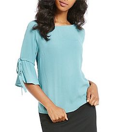 Gianni Bini Woven Katrina Tie Sleeve Blouse Casual Top With Blouson 3/4 Sleeves, Casual Blouson Sleeve Top, Casual Tops With Blouson 3/4 Sleeves, Spring Blue Tops With Blouson Sleeves, Blue Trendy Top With 3/4 Sleeves, Spring Tops With Blouson Sleeves And Stretch, Stretch Tops With Blouson Sleeves For Spring, Fall Brunch Tops With Half Sleeves, Half Sleeve Tops For Fall Brunch