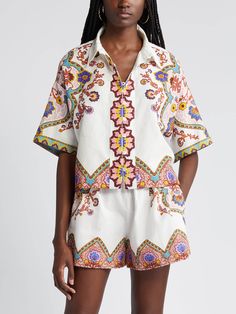 Add a vibrant touch to your wardrobe with the Ethnic Floral Print Shirt and Shorts Suit from LadyOccasions®. This charming set features a loose-fitting shirt with a V-neck and matching shorts. both adorned with an eye-catching floral print. Perfect for vacation or casual outings. this set ensures both comfort and style. See Moreï¼?a href="https://LadyOccasions.com/collections/vacation-new-style">Vacation-New-Style@Note:Size: please check measurements carefullyPlease allow 0.5-1" difference due to manual measurementDifferent monitor settings means colors may differ slightly1" = 2.54cmSize Chart : SIZE US UK EU BUST WAIST HIPS INCH CM INCH CM INCH CM S 2-4 6-8 36-38 33-35'' 84-89 26-27'' 66-69 36-37'' 91-94 M 6-8 10-12 38-40 36-38'' 92-97 28-29'' 71-74 38-40'' 96-102 L 10-12 14-16 40-42 40-4 Shirt And Shorts, Short Coat Jackets, Floral Print Shirt, Swimsuit Dress, Crown Hairstyles, Short Suit, Short Coat, Elbow Length Sleeve, Two Piece Outfit