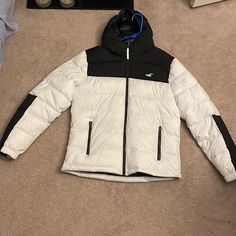 Brand New, Still Has Tags, Never Worn. White Hooded Puffer Jacket For Winter Sports, White Long Sleeve Puffer Jacket For Winter Sports, White Hooded Sporty Puffer Jacket, White Puffer Jacket For Winter Sports In Fall, Sporty White Puffer Jacket For Winter, Sporty White Winter Outerwear, White Long Sleeve Outerwear For Outdoor, White Hooded Puffer Jacket For Cold Weather, Casual White Puffer Jacket For Winter