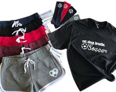 Our new go to short, for on or off the field comes with a soft black oversized Tee and a signature soccer headband. Our Relay Short not only looks great but is made to fit your active lifestyle, or relaxation time comfortably. Makes a great gift. 8.3 oz 70 / Cotton 30 / Poly Fit the shorts at http://wholesale.boxercraft.com/size_chart.html Youth Sizes YS 6-8 YM 10-12 YL 12-14 Womens Sizes S 4-6 M 8-10 L 12-14 XL 16 Casual Sports T-shirt With Team Name, Sporty T-shirt For Football Season, Sporty Black T-shirt For Football Season, Black Pre-shrunk Short Sleeve Activewear, Team Spirit Short Sleeve Activewear For Sports Events, Team Spirit Activewear For Sports Events, Breathable Casual T-shirt For Sports Events, Casual Cotton Activewear For Sports Events, Casual Black Activewear