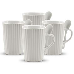 four white coffee mugs with spoons in them