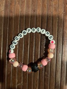 Decomposing beaded bracelet Bracelet Ideas To Sell, Single Kandi Bracelets, Bracelet Ideas Words, Halloween Kandi Bracelets, Funny Kandi Bracelets, Bracelet Themes, Kawaii Kandi Bracelets, Kandi Bracelet Ideas, Matching Kandi Bracelets