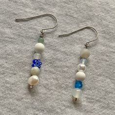 ◻️ millefiori, freshwater pearls and gemstone dangle earrings  ◻️ you will receive 1 pair of earrings and they will come in a gift bag ◻️ these earrings are made from stainless steel meaning your ears will not turn green  ◻️ please select which colour theme you would like from the drop down menu  ◻️ each pair of earrings will differ slightly because they are handmade  ◻️ if you would like a custom pattern please message and we will get back to you as soon as possible White Crystal Drop Earrings For Everyday, White Drop Crystal Earrings For Everyday, Everyday White Crystal Drop Earrings, Everyday Dangle Earrings With Natural Stones, Dangle Earrings With Natural Stones And Czech Glass, Dainty Beaded Everyday Earrings, Dainty Everyday Beaded Earrings, Hypoallergenic White Beaded Earrings For Everyday, White Czech Glass Beaded Dangle Earrings