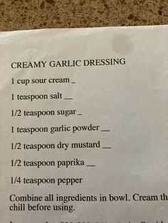 a menu listing creamy garlic dressing