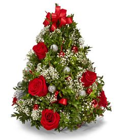 a christmas tree with red roses and baby's breath