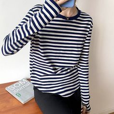 These Casual Thick Stripes Knitted Cotton T-Shirts For Women are ideal for you to make your personality more fascinating and cozy. It is comprised of high-quality cotton and polyester materials and has a conventional design. It is fashioned with an O-neck and offered in a variety of colorful colors and designs to make it more comfortable and attractive. Specification : Style: Casual Clothing Length: Regular Decoration: NONE Elasticity: Slight Strech Sleeve Style: Regular Fabric Type: Twill Mater Stripe Outfits, Shirts Women Fashion, Korean Casual, Striped T Shirt, Long Sleeve Tee Shirts, Basic Shirts, Spring Shirts, Style Korean, Knit Cotton