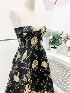 Little black dress with gold floral and bird embroidery | Etsy Gold Dress With Sweetheart Neckline For Banquet, Elegant Strapless Dress With Floral Embroidery For Party, Gold Satin Dress For Banquets, Gold Satin Dress For Banquet, Evening Strapless Sleeveless Dress With Floral Embroidery, Strapless Floral Print Evening Dress For Party, Brocade Party Dresses With Floral Embroidery, Gold Brocade Dress For Gala, Embroidered Satin Evening Dresses