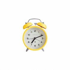 an alarm clock with two yellow hands on a white background