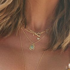 Lay your eyes on our everyday Dainty Layering Necklace. Not only is it made with a perfect dainty chain necklace that will effortlessly stack with everything in your collection, but the mini dangles around the chain elevate it to true must-have status. Dainty Charm Necklaces For Everyday, Dainty Charms Necklaces For Everyday, Dainty Charms Necklace For Everyday, Dainty Everyday Necklaces With Charms, Dainty Necklaces With Charms For Layering, Delicate Charm Necklace With Chain For Everyday, Dainty Gold Plated Chain Necklace With Charms, Dainty Chain Necklace With Round Pendant Charms, Dainty Lariat Charm Necklace For Everyday