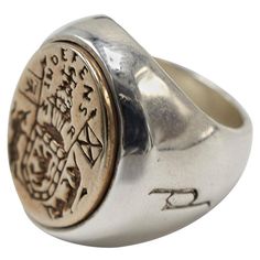 Crest Signet Ring Sterling Silver Bronze Unisex J Dauphin Inspired by Queen Mary of Scots ring. Gold signet-ring; engraved; shoulders ornamented with flowers and leaves. Oval bezel set with silver intaglio depicting achievement of Mary Queen of Scots: shield of Scotland surrounded by collar of thistle, supported by two unicorns; crest: crowned lion sejant affronté holding sword; dexter: banner with arms of Scotland; sinister: flag with three bars over saltire. Inscribed with a monogram surmounte Queen Mary Of Scots, Mary Of Scots, Lion Unicorn, Two Unicorns, Wax Seal Ring, Lion And Unicorn, Mary Queen Of Scots, Story Board, Gold Signet Ring