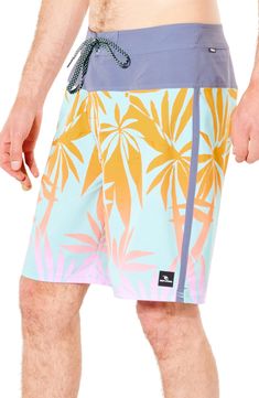 Stretchy, quick-drying fabric keeps you moving in and out of the water in board shorts sporting a classic knee length and secure storage for small essentials. 19" inseam 87% polyester, 13% elastane Machine wash, line dry Imported Moisture-wicking Surfing Beachwear Bottoms, Moisture-wicking Beachwear Bottoms For Surfing, Green Short Bottoms For Water Sports, Moisture-wicking Bottoms For Surfing, Moisture-wicking Green Shorts For Water Sports, Green Moisture-wicking Shorts For Water Sports, Functional Water Sports Shorts, Functional Moisture-wicking Bottoms For Surfing, Green Nylon Shorts For Water Sports