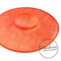 This orange cartwheel hat base is a classic shape that has sprung into popularity in the past year. Made from 2 layers of stiffened sinamay, these cartwheels are ready to trim and are fitted with a petersham ribbon on the inside crown edge. Simply add a comb or headband to secure to the head.Hat base measures:Width: 35.5cm (14 inches)Crown Width: 13.5cm (5.3 inches)Crown Height: Approximately 3.5cm (1.7 inches)For even more millinery supplies you can find us here:www.etsy.com/shop/PetershamsAll Orange Adjustable Hat With Curved Brim, Adjustable Orange Hat With Curved Brim, Orange Sun Hat With Curved Brim, Orange Curved Brim Sun Hat, Orange Brimmed Straw Hat With Adjustable Fit, Adjustable Orange Straw Hat With Curved Brim, Adjustable Brimmed Orange Straw Hat, Adjustable Brimmed Orange Hat, Adjustable Orange Brimmed Hat