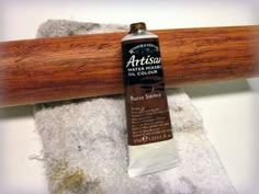 an image of a wooden bat and towel