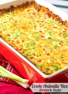 a casserole dish with broccoli, cheese and green onions in it