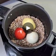 an image of food cooking in a pot on the stove top that is ready to be cooked