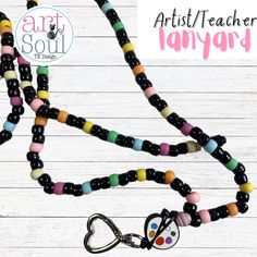 A unique and fun way to show off your Art skills! Whether you're an artist or an Art teacher, you'll be in style with this fun handmade beaded lanyard! Product Details: ❤️ Perfect for Artists and Teachers who loves Art! 🎨🖌️🖼️ ❤️ Available Size:  Standard: 19 inches Long: 23 inches ❤️ Handmade: Nylon String, Beads, Silicone Bead, and Breakaway Clasp Themed Multicolor Craft Supplies For Gifts, Fun Multicolor Craft Supplies For Hobby, Handmade Black Crafts For Crafting, Whimsical Multicolor Crafts For Gifts, Customized Multicolor Craft Supplies For Gifts, Multicolor Handmade Craft Supplies For Teacher Appreciation, Handmade Multicolor Craft Supplies For Teacher Appreciation, Diy Multicolor Craft Supplies For Gifts, Personalized Multicolor Craft Supplies For Gift Making