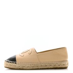 This is an authentic pair of CHANEL Lambskin CC Espadrilles size 35 in Beige and Black. These lovely espadrille shoes are crafted of soft lambskin leather in beige with a Chanel CC patch and a black toe cap. Beige And Black, Espadrille Shoes, Lambskin Leather, Espadrilles, Chanel, Leather, Black