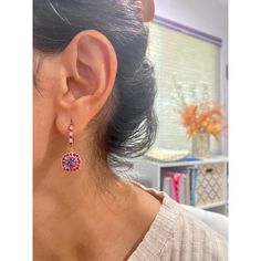 These cute and dainty Earrings have 2 Cushion Cut Amethysts that weigh 2.27 Carats and are embellished with 46 Round Cut Red and White Sapphires that weigh 1.56 Carats. The Total Carat weight of the Earrings are 3.83 Carats. The Earrings are about an 1.2 inches in length They are beautifully set in 14 Karat Rose Gold and weigh approximately 4.9 Grams.   Exact dimensions for this item are unknown. Please reach out in the seller Q&A for any questions on measurements. Elegant Rose Gold Multi-stone Earrings, Unique Purple Jeweled Dangle Jewelry, Pink Multi-stone Earrings In Fine Jewelry Style, Pink Multi-stone Earrings Fine Jewelry, Purple Multi-stone Earrings For Anniversary, Purple Jeweled Earrings As Gift, Purple Jeweled Earrings For Gift, Multi-stone Earrings For Anniversary, Fine Jewelry Purple Drop Earrings