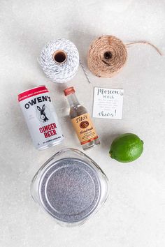 the ingredients for this recipe are laid out on top of the white countertop, including limes and twine