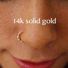 Tribal Piercing, Tiny Nose Ring hoop made of 14K solid gold, perfect for helix, cartilage, rook, tragus, daith This listing is for ONE single hoop 14k solid gold wire-wrapped hoop piercing, with three tiny gold beads (approx. 0.08 Inch, 2mm).  The wiring and beads are 9k solid gold. This dainty piercing is perfect for every occasion, from an everyday t-shirt and jeans combo to a boho-chic night out. Try this beautiful hoop for a super cool stylish look or get it as the ultimate gift for your lov Nostril Hoop Piercing, Nose Piercing Indian, Piercing Snug, Ring Nose Piercing, Nostril Jewelry, Tiny Nose, Hoop Piercing, Tragus Daith, Nostril Piercing